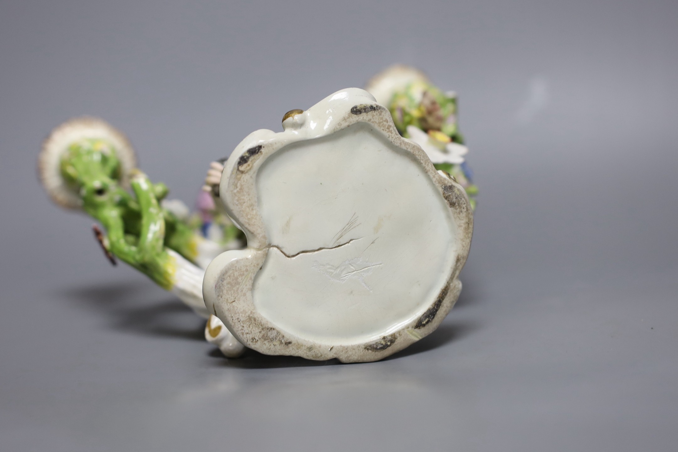 An 18th century English porcelain 3 branch candelabrum, probably Bow, 23cms high